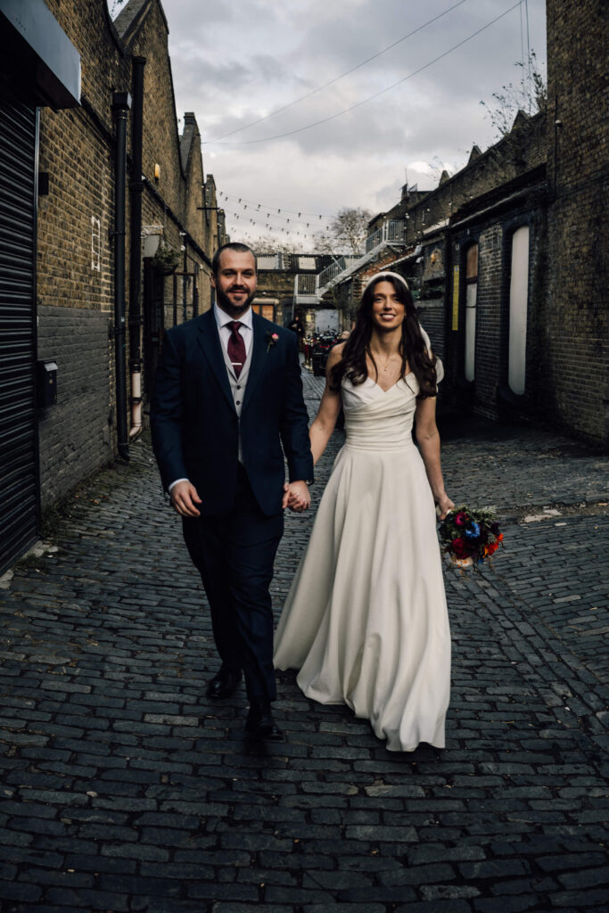 A couple just married at Clapton Country Club in London. Shot by UK wedding photographer, Chris Goddard.