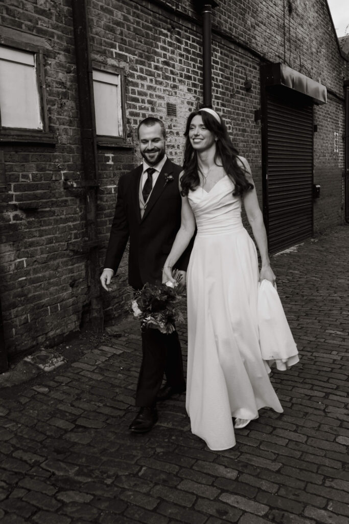 A couple just married at Clapton Country Club in London. Shot by UK wedding photographer, Chris Goddard.