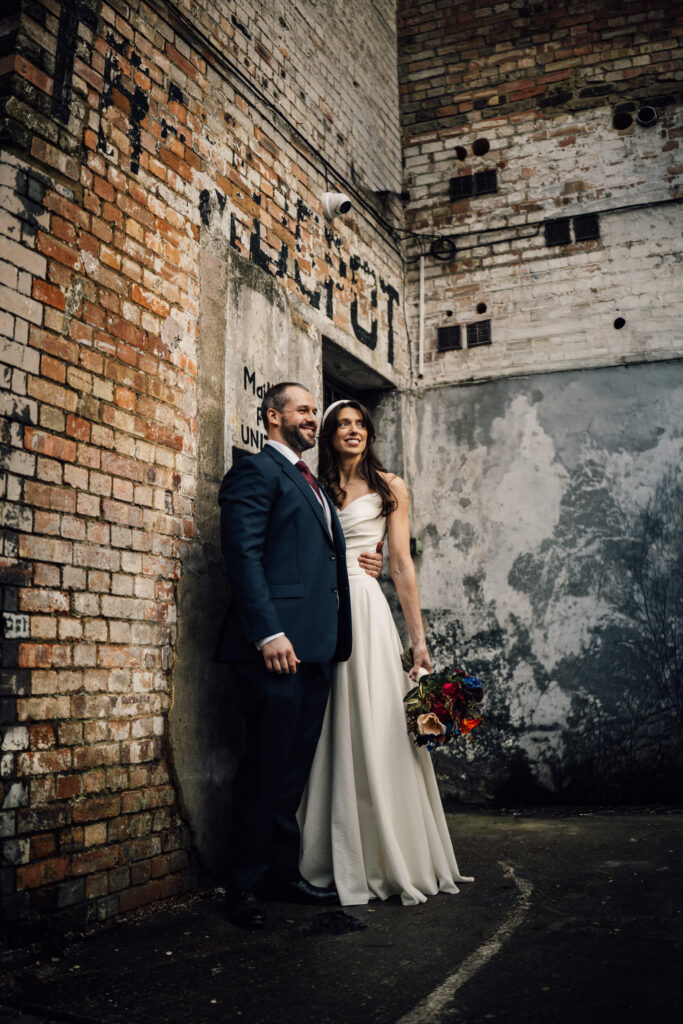 A couple just married at Clapton Country Club in London. Shot by UK wedding photographer, Chris Goddard.