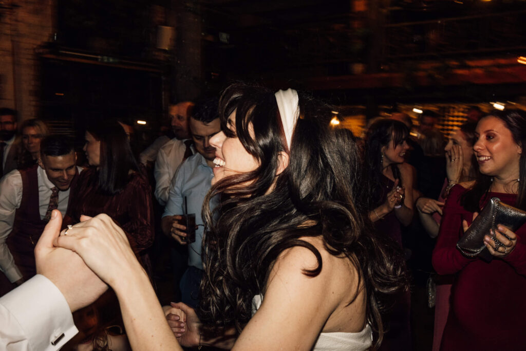 A couple just married at Clapton Country Club in London. Shot by UK wedding photographer, Chris Goddard.