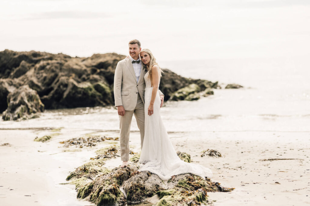 Married couple at cornish coastal wedding, shot by wedding photographer, chris goddard