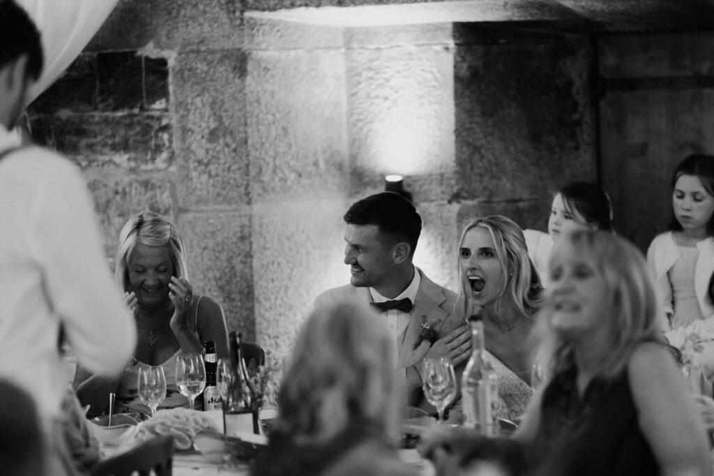 Married couple at cornish coastal wedding, shot by wedding photographer, chris goddard