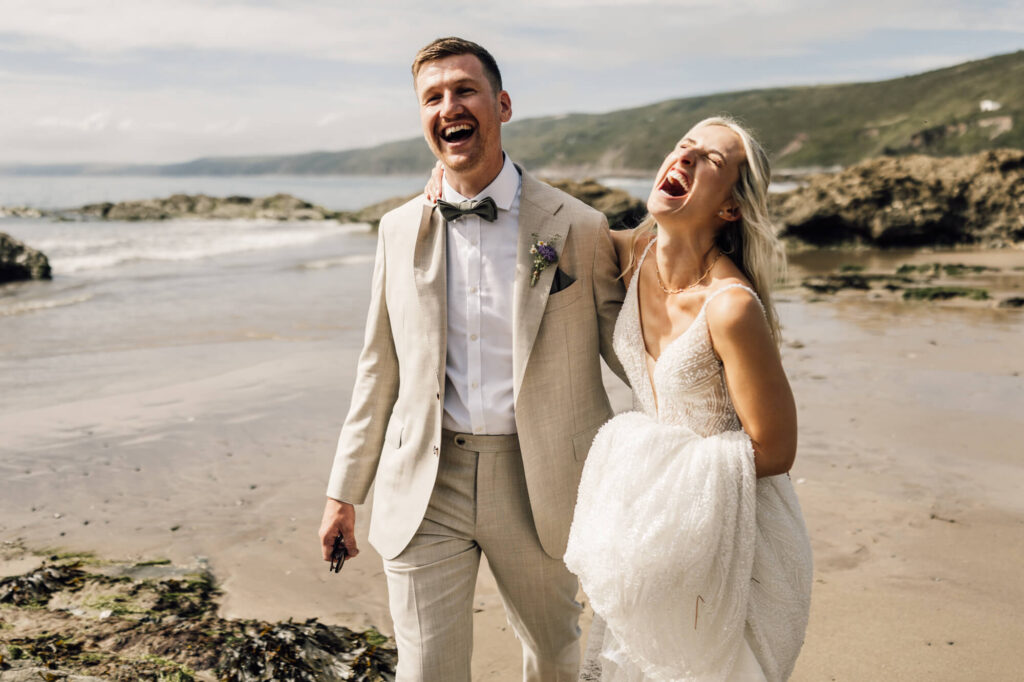 Married couple at cornish coastal wedding, shot by wedding photographer, chris goddard