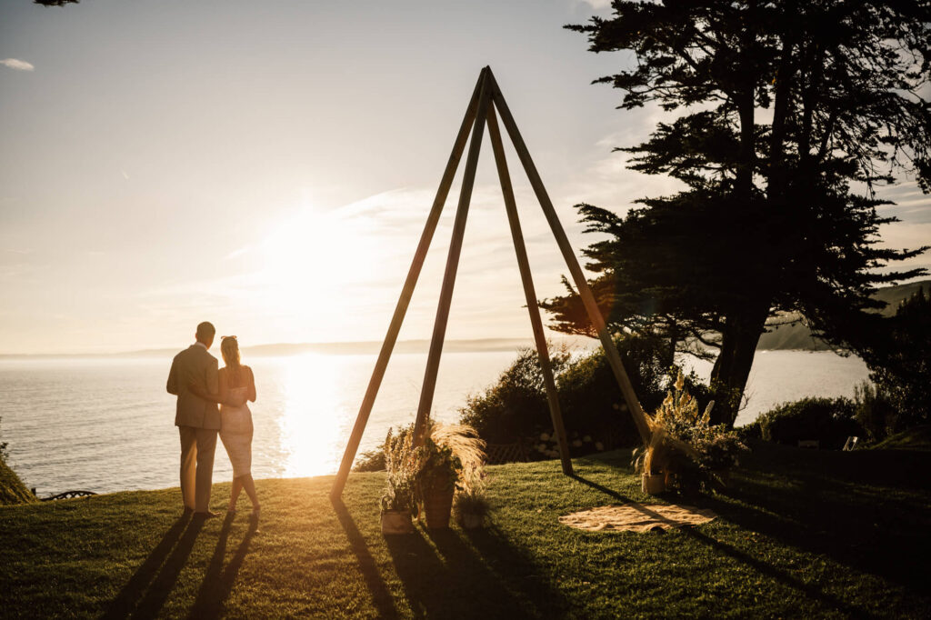 Married couple at cornish coastal wedding, shot by wedding photographer, chris goddard