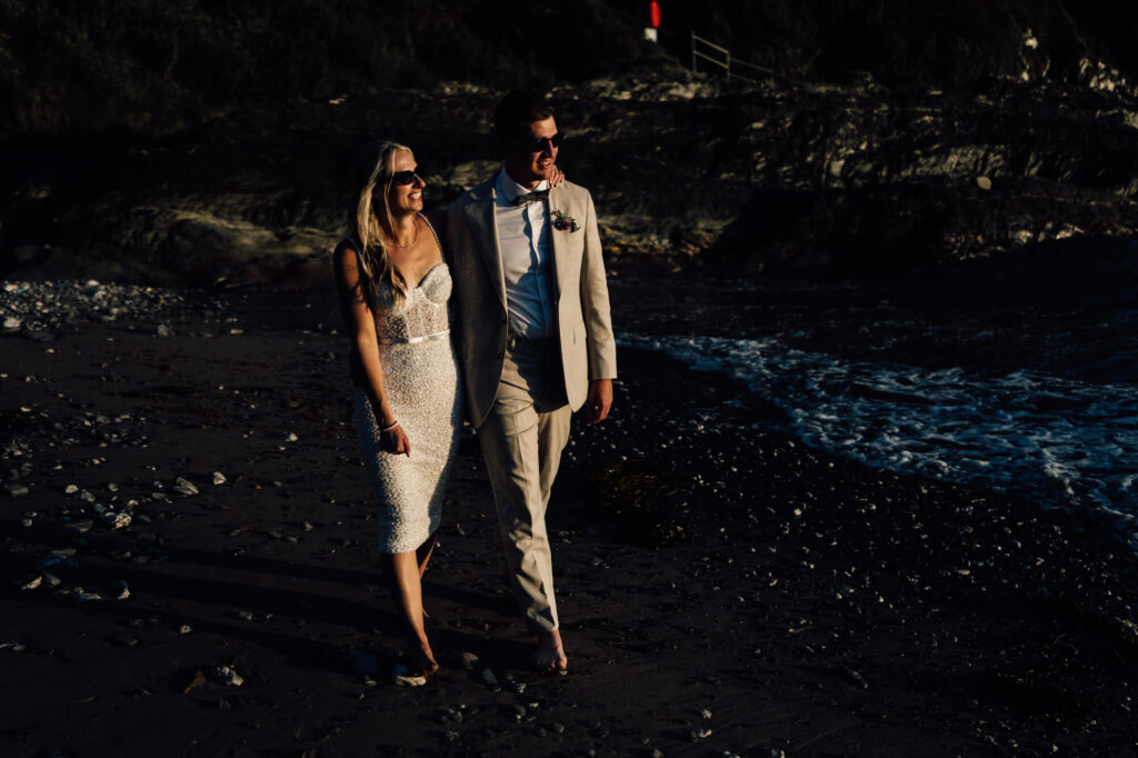 Married couple at cornish coastal wedding, shot by wedding photographer, chris goddard