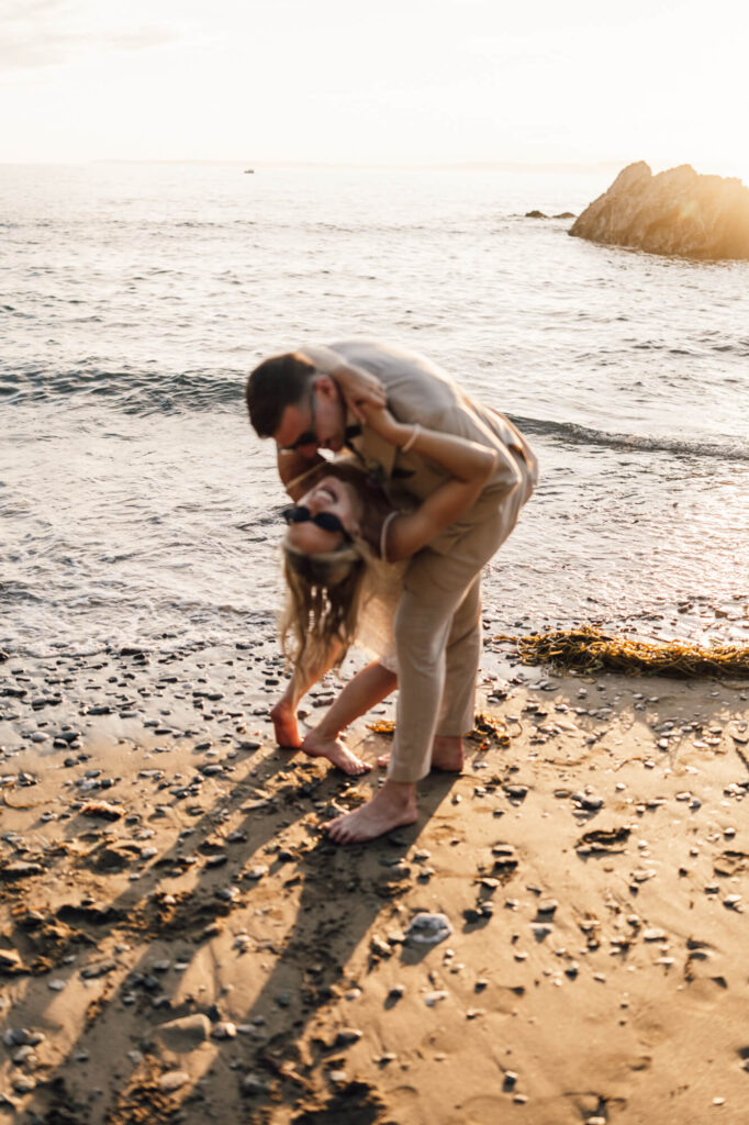 Married couple at cornish coastal wedding, shot by wedding photographer, chris goddard