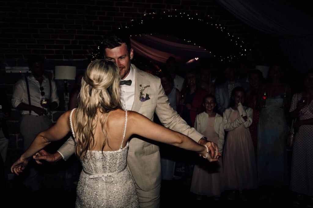 Married couple at cornish coastal wedding, shot by wedding photographer, chris goddard