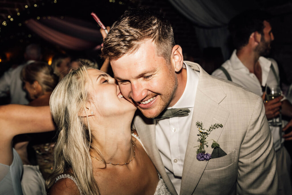 Married couple at cornish coastal wedding, shot by wedding photographer, chris goddard