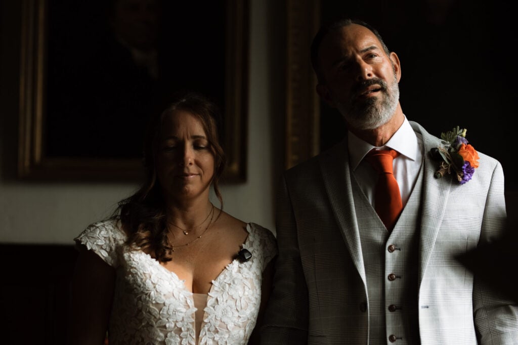 Bride and Groom getting married at Lyme Regis Guild Hall. Shot by Dorset, Devon and Cornwall Wedding Photographer, Chris Goddard
