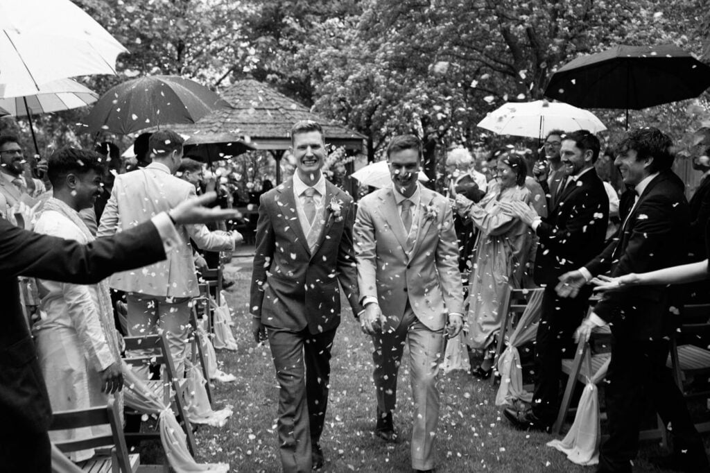 Image of two grooms shot by devon and cornwall wedding photographer, chris goddard