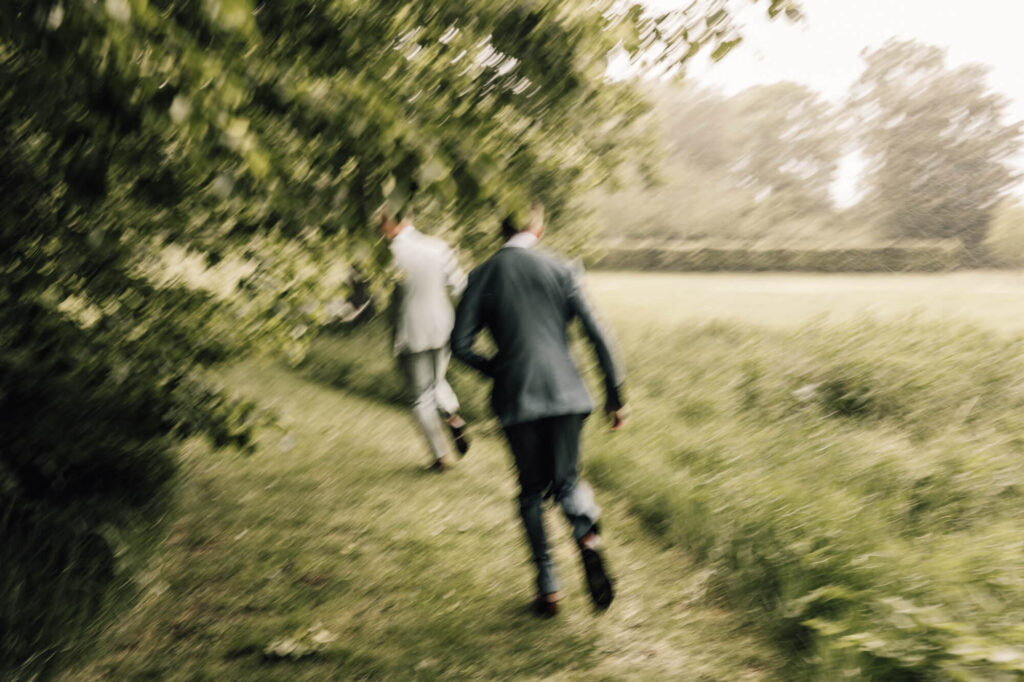 Image of two grooms shot by devon and cornwall wedding photographer, chris goddard