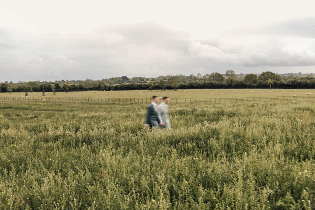 Image of two grooms shot by devon and cornwall wedding photographer, chris goddard